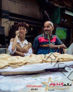 "أحمد رودريجز" و "مريم" في أحدث جلسة تصوير ب "سوق راتب" منشية الإسكندرية 