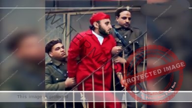 حقيقة صورة محمد عادل المتداولة بالبدلة الحمراء