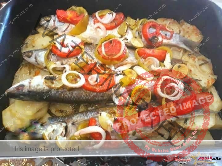 صينية السمك البوري بالبطاطس فى الفرن ... مقدمة من الشيف: أماني رضا