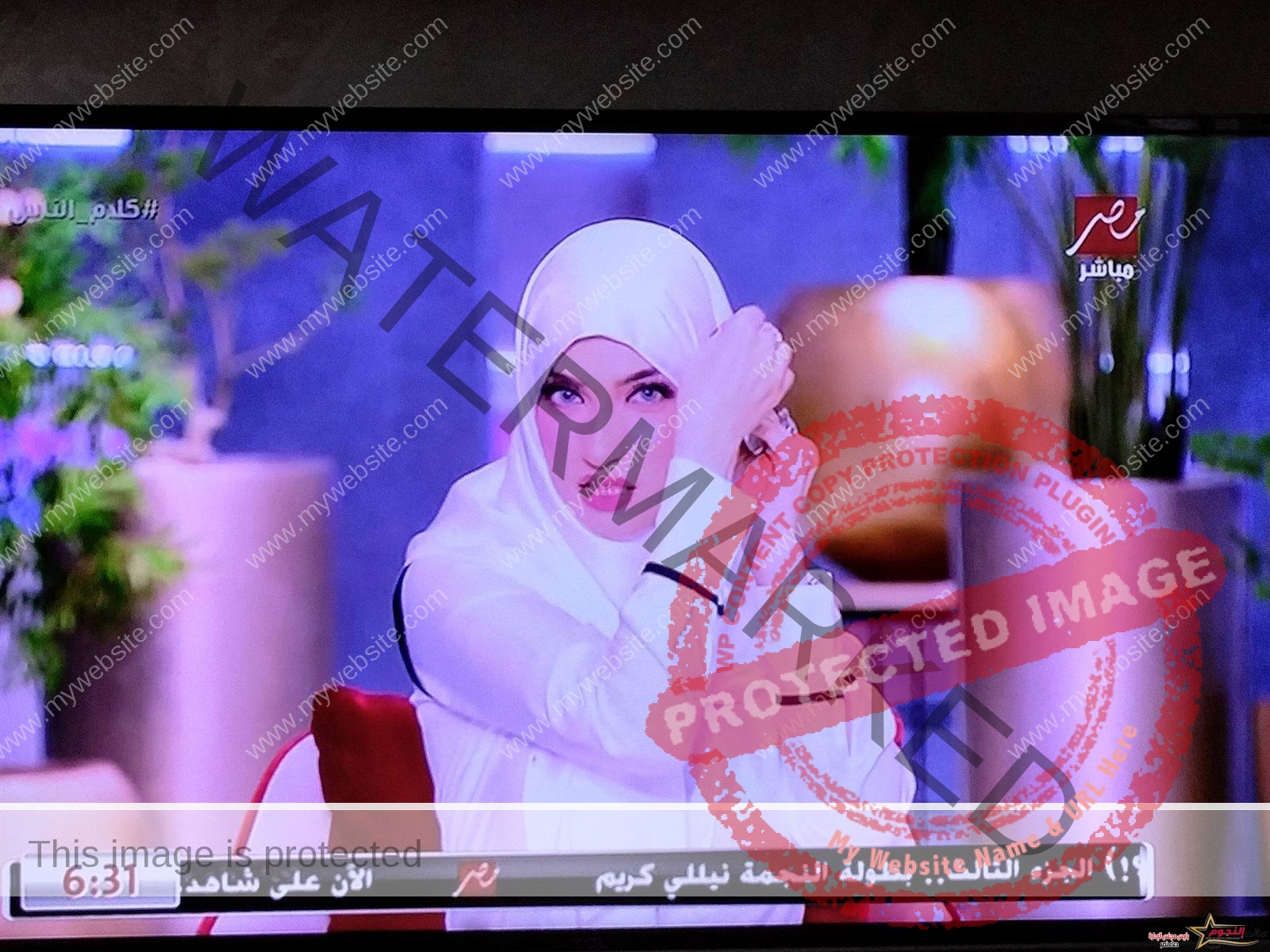 ياسمين عز تظهر بالحجاب على الهواء.. يارب يهدينا جميعًا