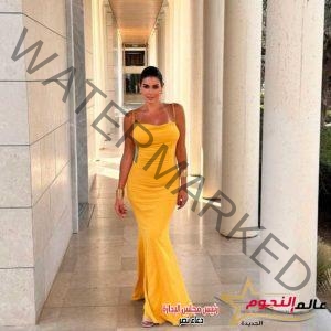 ياسمين صبري متألقة بفستان أصفر في ظهورها الأحدث