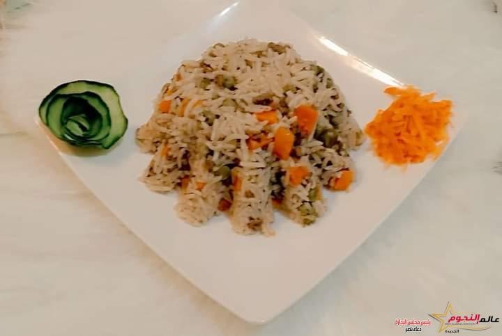 طريقة تحضير الأرز البسمتي بالمكسرات من مطبخ عالم النجوم 1 طريقة تحضير الأرز البسمتي بالمكسرات من مطبخ عالم النجوم