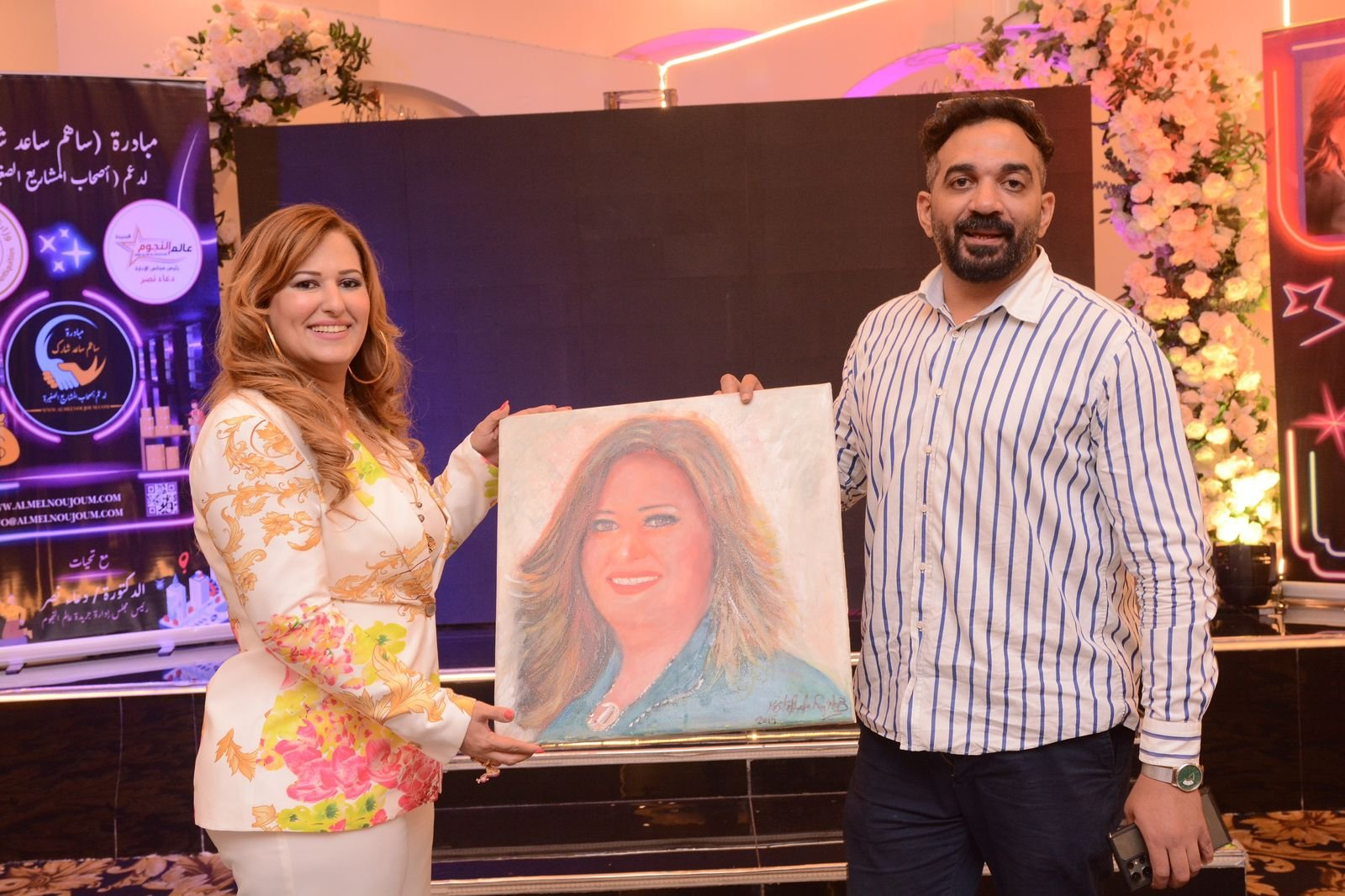 مصطفى راغب يخلّد بريشته مسيرة دعاء نصر في خدمة المجتمع